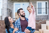 Fototapeta  - family moving into new house