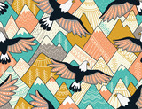 Ethnic seamless pattern with with mountains and eagles. Bright ornamental vector background for fabric, wrap paper and wallpaper.