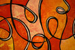 Close up photograph of an abstract painting. Swirls in shades of orange. Hand painted background on paper. 