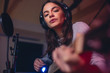 © Jacob Lund - Guitarist playing guitar in a recording studio