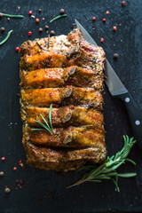 Canvas Print - Pork loin on bone baked with herbs