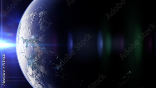 Obraz na płótnie planeta Ziemia przed jasnym słońcem