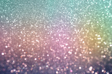 colorful green pink purple and blue bokeh light glitter soft tone background for Christmas and New Year's day