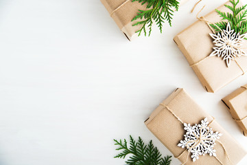 christmas and new year holiday background. xmas greeting card. christmas gifts on white wooden backg