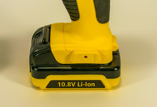 Yellow Hand-held Cordless Screwdriver For Professional Work.