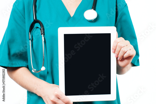 Fotografie, Obraz Doctor holding blank digital tablet on white background.
