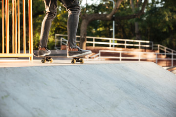 Sticker - Close up of a young teenage skateboarder in action