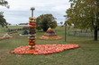 Autumn harvested pumpkins arranged for fun like pyramid