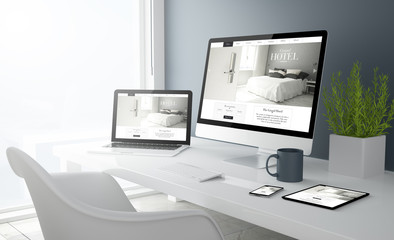 Wall Mural - grey studio devices with hotel website