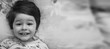 © alexkich - Black and white photo portrait of a young child lying on a pillow