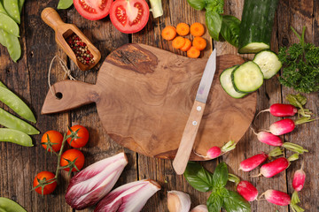Wall Mural - cutting board with raw vegetable