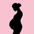 Pregnant Woman black Silhouette isolated on pink background