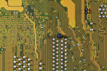 Gold Circuit Board Background Of Computer Motherboard
