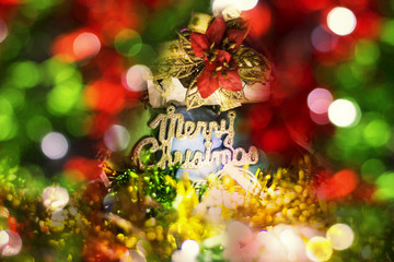 Wall Mural - Christmas decoration on a golden background. bokeh background and dark mirror floor.