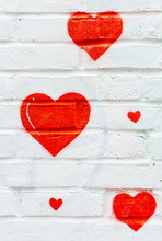 Close-up Of Red Hearts Painted On A White Wall
