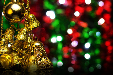 Wall Mural - Christmas decoration on a golden background. bokeh background and dark mirror floor.