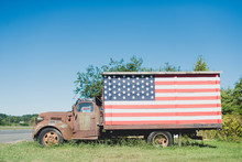 Abandoned Truck With American Flag