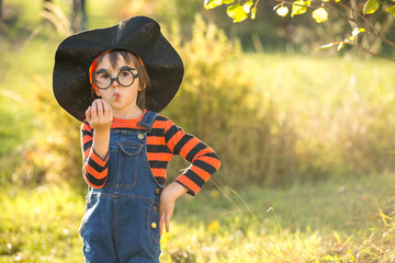 Canvas Print - Cute little boy, playing with halloween costume in the park