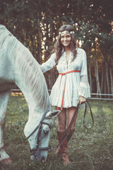 Wall Mural - Beautiful young woman and horse