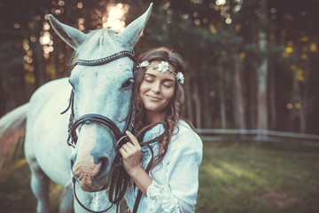 Wall Mural - Beautiful young woman and horse