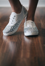Girl Wearing Sparkly Shoes With Rhinestones