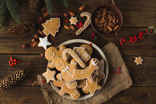 Ginger Men On A Wooden Background. Gingerbread. Christmas Cookies