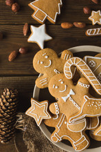 Ginger Men On A Wooden Background. Gingerbread. Christmas Cookies