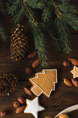 Wall Mural -  Christmas cookies  on a wooden background. Gingerbread.