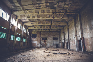  Abandoned industrial warehouse on ruined brick factory, creepy interior, perspective