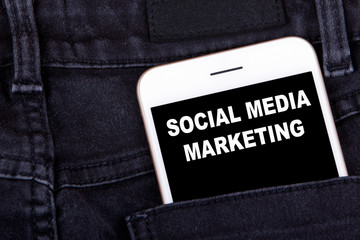 Wall Mural - social media marketing. smartphone in jeans pocket. technology business and advertising campaign dev