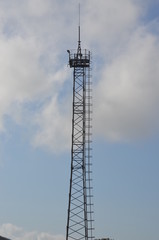 an observation tower in the sky, blue sky background high-rise tower