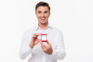 Sticker - Portrait of happy young man showing open box