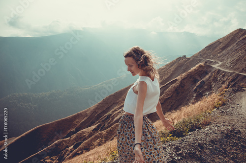 Fotografía Romantic free young woman with hair wind enjoy harmony with nature and fresh air