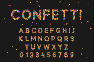Wall Mural - Font set with letters from multi-colored paper confetti.