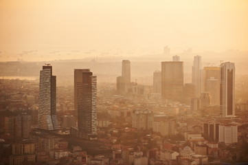 Wall Mural - Aerial view of the Istanbul city downtown with skyscrapers at sunset