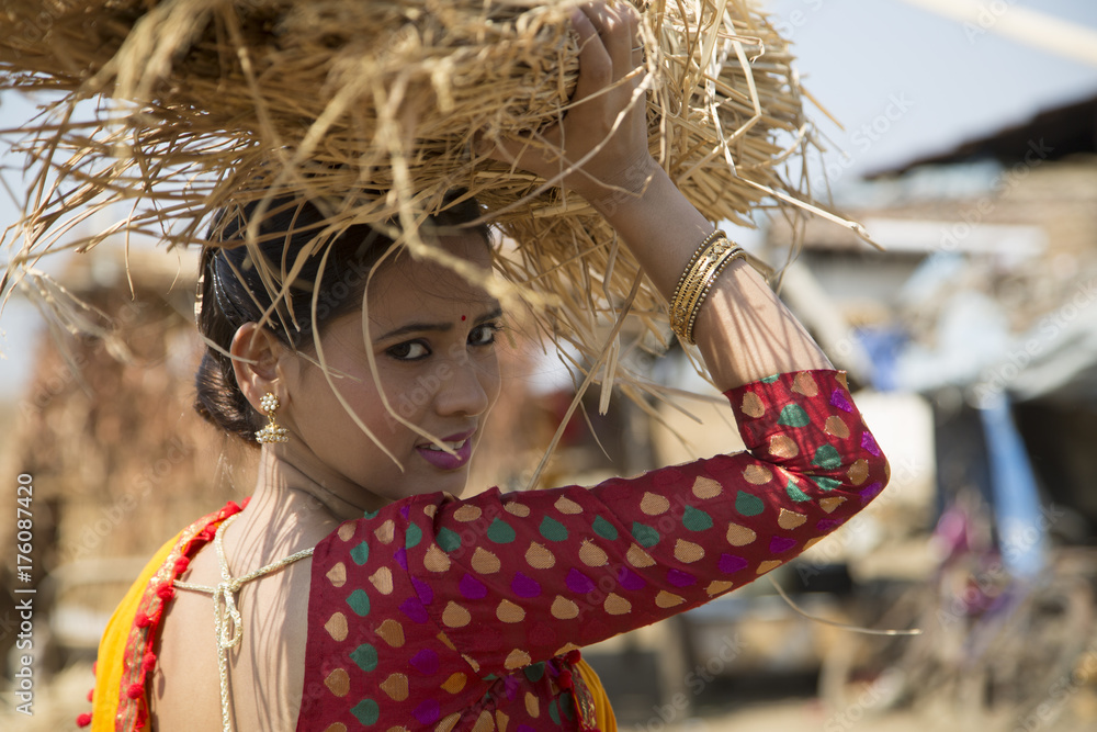 Young Indian woman working outdoor in rural village of India Stock ...