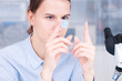 © luchschenF - student girl with glass empty microscope slide in hand