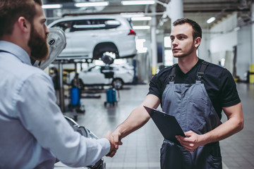 Wall Mural - Men in auto service