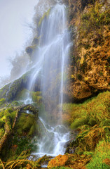  Beautiful landscape with mountain waterfall
