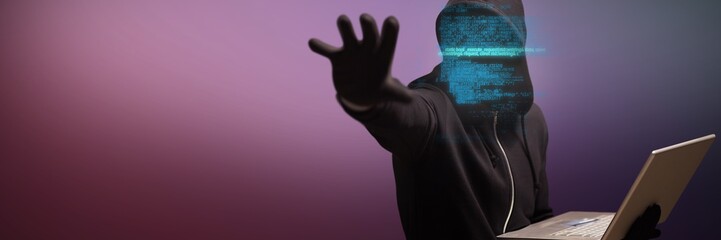Wall Mural - Composite image of hacker holding laptop while gesturing
