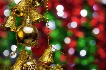 Wall Mural - Christmas decoration on a golden background. bokeh background and dark mirror floor.