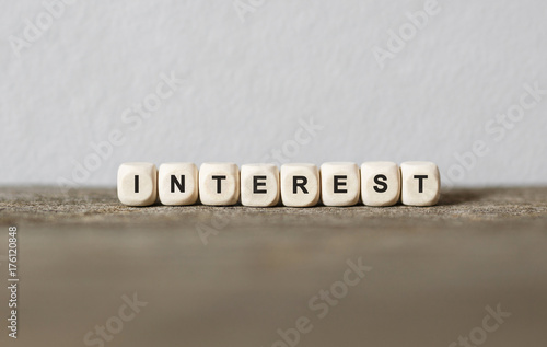 Fotografía Word INTEREST made with wood building blocks