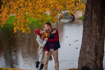 Wall Mural - Beautiful pair of lovers walking in the autumn Park