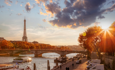 Fototapete - Paris with Eiffel Tower against colorful sunset in France