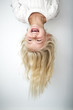 © Louis-Paul Photo - Cute girl 4-5 year old posing in studio upside down