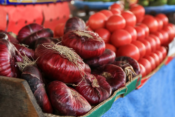 Wall Mural - Fresh red onion at market, closeup