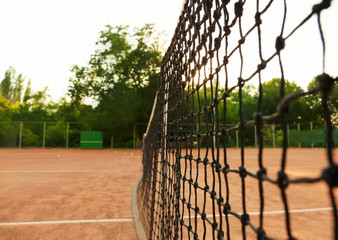 Canvas Print - Tennis net on court, outdoors