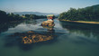 © Koki Jovanovic/Stocksy - cottage on the rocks in the river Drina