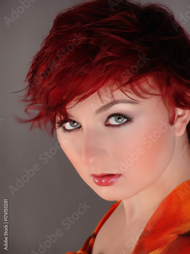 Pretty Redhead Short Hair Pregnant Woman On The Grey Studio