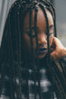 © ZOA/Stocksy - Woman looking down at the ground